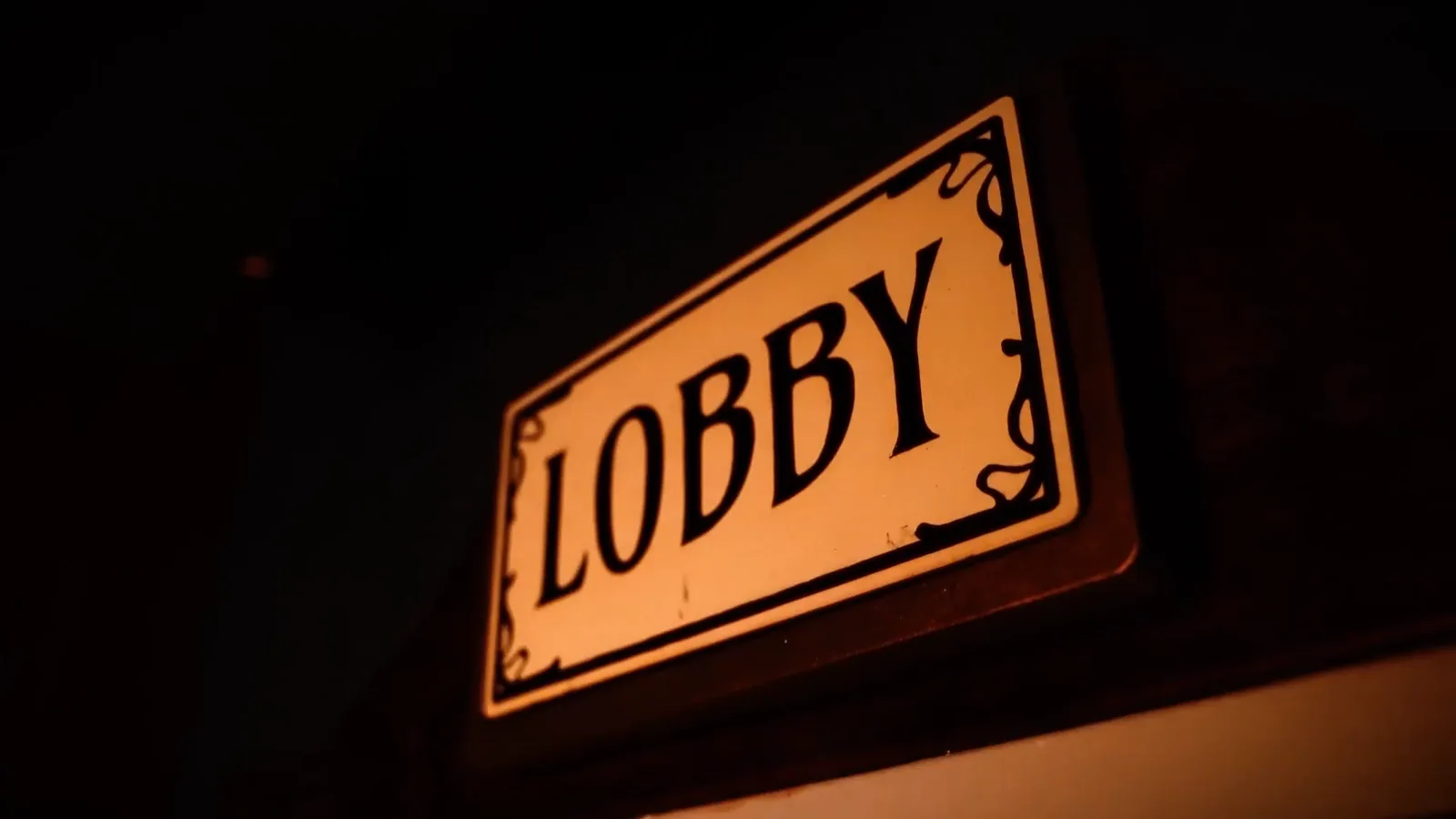 An enamel Lobby sign in the Hotel: Murder Mystery set